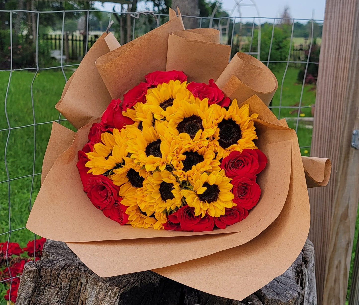 Roses with sunflowers